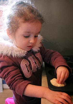 child learning to bake bread