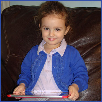 preschool girl on iPad