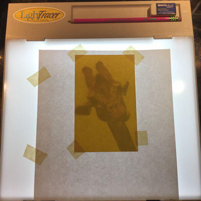 a tracing light box is very helpful when doing geometric animal art