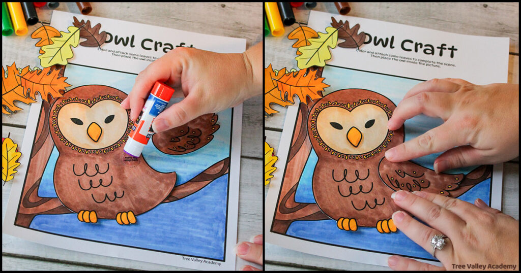 Gluing a wing to a paper owl. First, use a gluestick to add glue to a marked round spot on the owl's body. Then glue the wing into place.