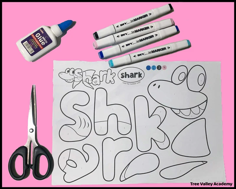The supplies needed for the S is for Shark craft for kids are scissors, glue, a 4 crayons or markers (black, light pink, dark blue, and light blue), and the printable color by number coloring page.