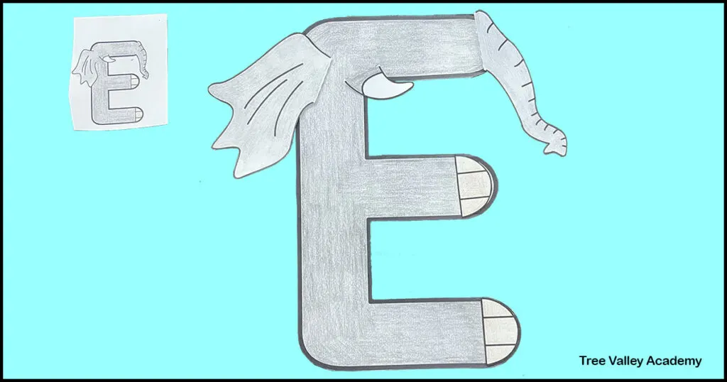 Step 3 of a letter E preschool alphabet craft: using the small image on the printable to see how to place the elephant's trunk, tusk, ear, and toenails on the uppercase letter E.